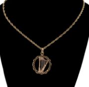 CLOGAU 9CT GOLD 'WELSH HARP' PENDANT, on chain, pendant 1.5cms (diam.), total wt. 4.9g, boxed