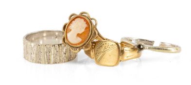 FOUR 9CT GOLD RINGS, one set with shell cameo, 10.8g Provenance: private collection Caerphilly