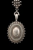 VICTORIAN WHITE METAL LOCKET ON CHAIN, 90g / 2.9ozt Provenance: consigned form Swansea Borough
