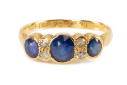 18CT GOLD SAPPHIRE & DIAMOND RING, the three oval-cut sapphires complimented by four small diamonds,