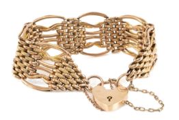 9CT GOLD GATE LINK BRACELET, part engraved links, padlock clasp, wt. approx. 28.8g Provenance: