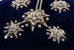 ANTIQUE DIAMOND ENCRUSTED STARBURST DESIGN PARURE, comprising pendant brooch, pair of smaller
