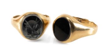 TWO 9CT GOLD RINGS, comprising hematite intaglio signet ring, and onyx signet ring, ring sizes O and