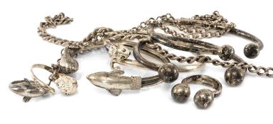 ASSORTED SILVER JEWELLERY, comprising four silver torque bracelets, three torque style silver