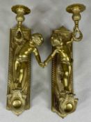 PAIR OF GILDED CAST BRASS CHERUB WALL SCONCES, 33cms (h) Provenance: private collection Ynys Môn