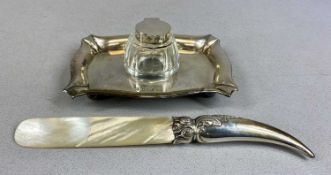 SILVER MOUNTED DESK ACCESSORIES, comprising Edwardian silver ink stand, shaped rectangular tray on