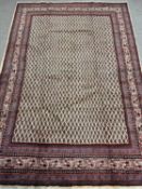 BOTTEHMIR WOOL CARPET, cream and red ground, 318 x 212cms Provenance: private collection