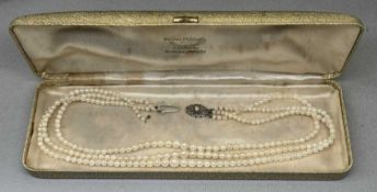NATURAL PEARL THREE-STRAND NECKLACE, with silver clasp marked '925', 43cms (l) Provenance: private