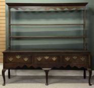 19th CENTURY SHROPSHIRE DRESSER open plate rack back with moulded cornice and scrolled frieze, two