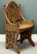 ECCLESIASTICAL HALL CHAIR, late 19th century, pierced back with carved shield, shaped end supports