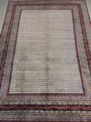 ARAAK WOOL CARPET, cream and red floral design, 333 x 245cms Provenance: private collection