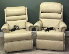 TWO CREAM VINYL UPHOLSTERED ELECTRIC RECLINING ARMCHAIRS, both having power packs Provenance: