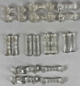 NINE PAIRS OF GLASS KNIFE RESTS, some with cut decoration Provenance: private collection Ynys Môn