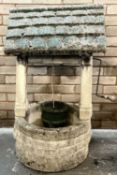 DECORATIVE CONCRETE GARDEN WISHING WELL Provenance: private collection Conwy