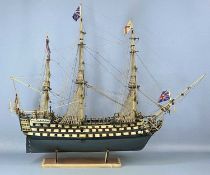 SCRATCH BUILT SCALE WOODEN MODEL OF HMS VICTORY, on stand, 76 (h) x 100cms (l) Provenance: private