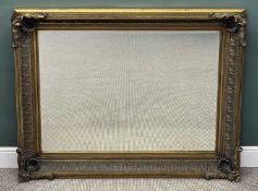 LARGE ORNATE RECTANGULAR GILT FRAMED WALL MIRROR with bevelled plate, 124 (h) x 152cms (w)
