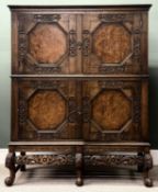GOOD QUALITY CONTINENTAL WALNUT & OAK CABINET, four doors carved and with shelf lined interiors,