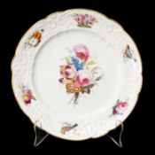 NANTGARW PORCELAIN BRACE SERVICE PLATE circa 1813-1820, having a typically moulded border with
