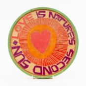 ‡ PAUL PETER PIECH (1920-1996) carved wooden roundel - with the slogan 'Love is Nature's Second