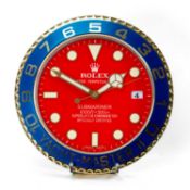 ROLEX-STYLE WALL CLOCK, modelled as an Oyster Perpetual Submariner watch, red dial, blue bezel,
