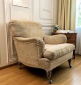 HOWARD & SONS 'BRIDGEWATER' STYLE MAHOGANY FRAMED ARMCHAIR, believed late Victorian, turned front