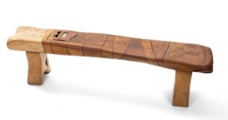 JOHN CLEAL (1929-2007) 'RADIO BENCH' - beech bench part covered with decorated tooled leather,