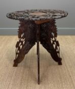 ANGLO-INDIAN CARVED HARDWOOD FOLDING OCCASIONAL TABLE, 69 (h) x 69cms (dia.) Provenance: consigned