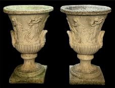 PAIR OF RECONSTITUTED STONE GARDEN URNS of campana form, moulded with classical figures, 80 (h) x