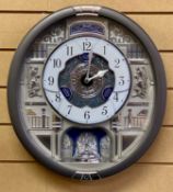 SEIKO 'MELODIES IN MOTION' WALL CLOCK, quartz movement, playing various tunes, boxed, 45 x 40cms