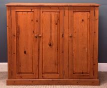 MODERN PINE STORAGE CUPBOARD having three doors, 124 (h) x 141 (w) x 43cms (d) Provenance: