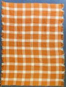 THREE WELSH WOOLLEN WAFFLE BLANKETS, orange and cream check with fringed ends, all with Meirionweave