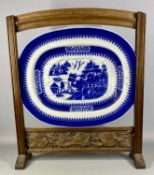 STAFFORDSHIRE BLUE & WHITE TRANSFER DECORATED INDENTED MEAT PLATE, 19th century, with gravy well,