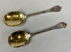 EDWARD VII PAIR OF SILVER SERVING SPOONS, shaped handle tops, rattail backs, and gilded bowls,