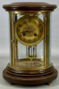 FRENCH OVAL MAHOGANY & GILT BRASS FOUR-GLASS MANTEL CLOCK, gilded dial with Arabic numerals, 8-day