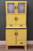1950s KITCHEN LARDER UNIT, painted yellow, upper section with glazed doors, white enamel work