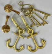 SET OF ORNAMENTAL BRASS KEYS ON A LOOP, ornamental anchors and a pair of copper door handles