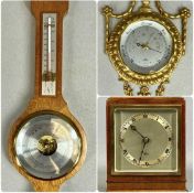 CLOCKS & BAROMETERS, Elliott walnut cased mantel clock, silvered dial, gilded bezel and bun feet,