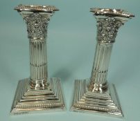 PAIR OF EDWARDIAN SILVER CORINTHIAN COLUMN DWARF CANDLESTICKS, maker J & T, Sheffield 1902 (loaded),