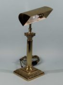 BRASS STUDENT'S DESK LAMP with Corinthean column and adjustable shade, 38cms (h) Provenance: private