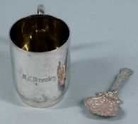 GEORGE V SILVER CHRISTENING MUG of plain design, inscribed 'M. C. Bromley' and with gilded interior,