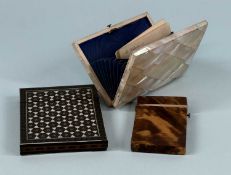 THREE 19TH CENTURY CALLING CARD CASES, mother of pearl veneered with silk lined interior, 10.5 x 7.