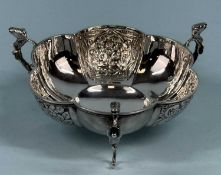 GEORGE V CIRCULAR SILVER BON BON DISH, of lobed design, alternate lobes embossed with scrolls, on