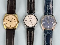 THREE WRISTWATCHES, Bulova Ambassador Automatic with gold-plated case, Bulova with blue dial, and