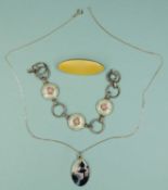 GUSTAV GAUDERNACK (1865-1914) ENAMELLED EVENING SILHOUETTE SILVER PENDANT NECKLACE; together with