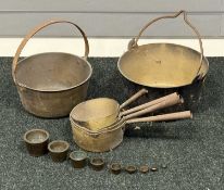 ANTIQUE METALWARE, two circular brass jam pans, largest 16 (h) x 31.5cms (diam.); graduated set of