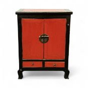 CHINESE RED & BLACK LACQUERED TWO-DOOR CUPBOARD, with brass lock plate, two drawers to base with
