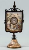 19TH CENTURY FRENCH ENAMELLED MINIATURE CLOCK, painted with figures and birds, gilded brass frame,