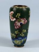 JAPANESE CLOISONNÉ BALUSTER VASE, green ground and decorated with blossom, 23cms (h) Provenance: