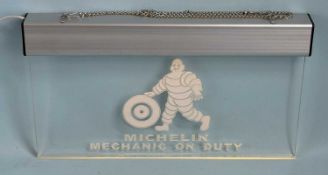 MICHELIN 'MECHANIC ON DUTY' ILLUMINATED HANGING SIGN, 39 x 23cms Provenance: The collection of