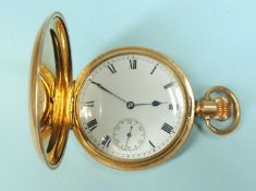 AMERICAN WALTHAM GOLD-PLATED TRAVELLER HUNTER POCKET WATCH (currently ticking), 50mms (diam.)